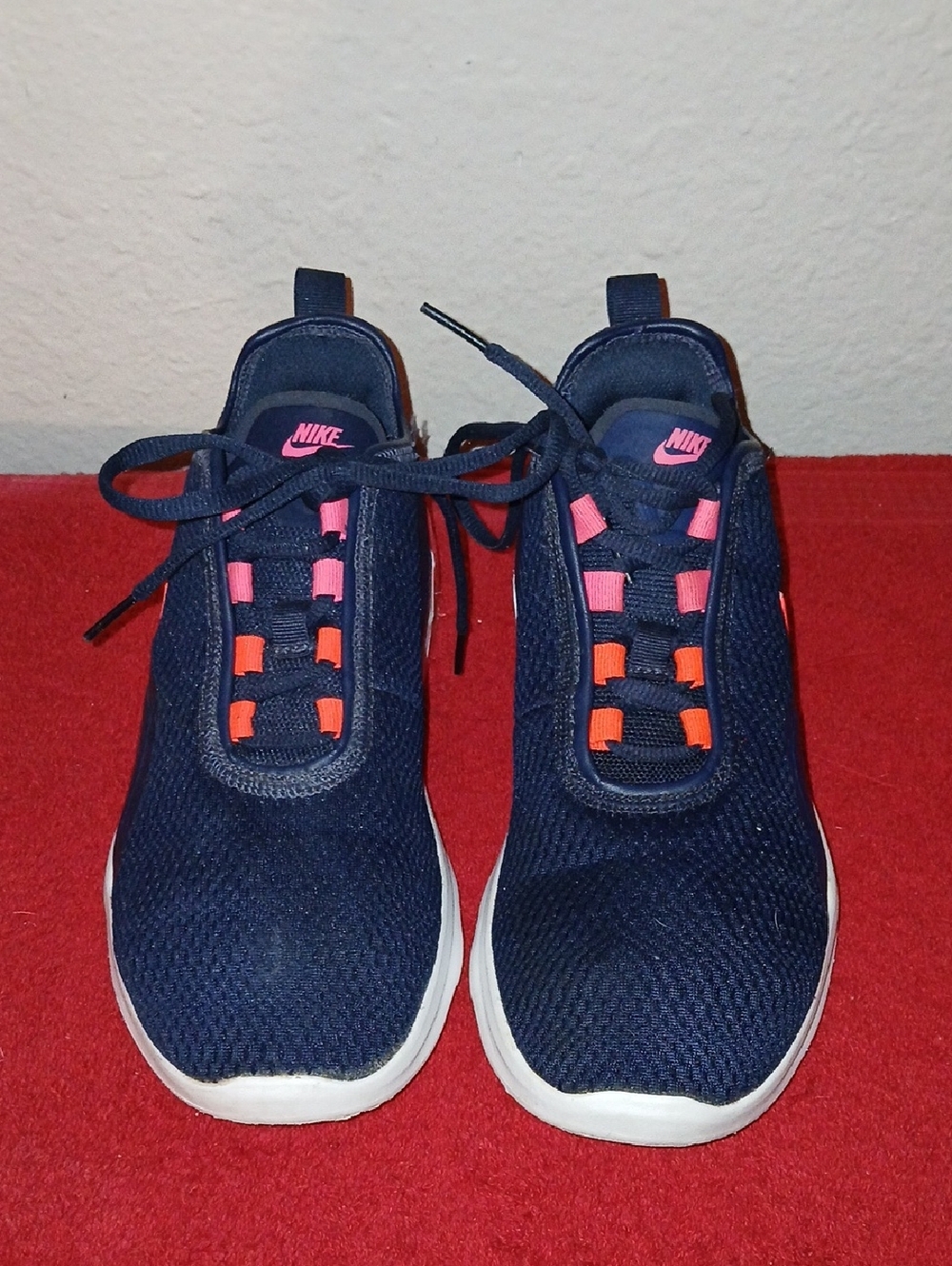 Nike Women's Navy Mesh Sneakers with Pink and Orange Details